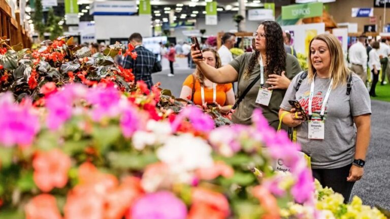 Event participants and vistors visiting and taking pictures of the New Varieties Zone at Cultivate from AmericanHort