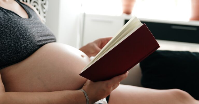 pregnant woman lying on