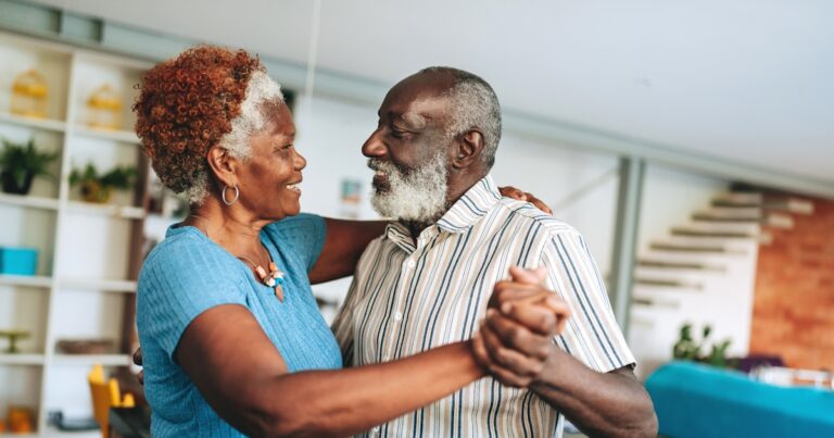 senior couple dancing at