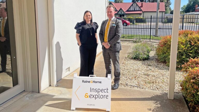 L R Gwen Levesque and James Trimble outside new Salisbury office