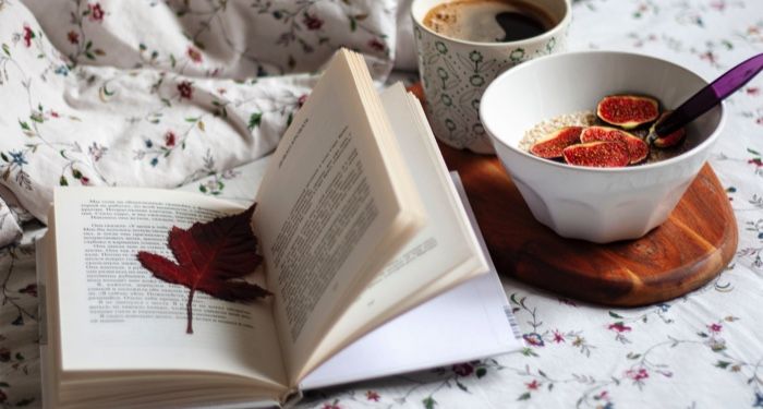 open book with fall leaf bookmark coffee and breakfast feature 700x375 1.jpg.optimal