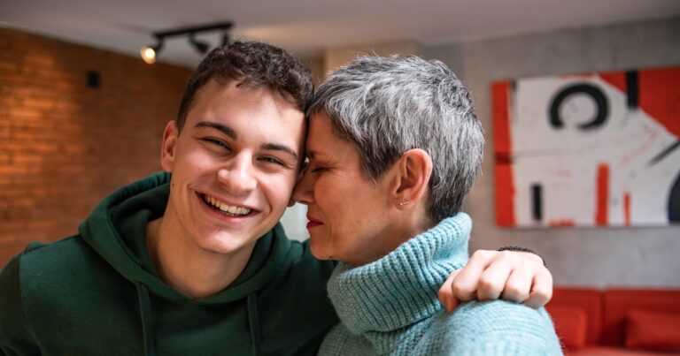 mother teenage son hugging